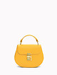 Круглая сумочка из желтой кожи  Folle