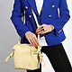 Нежно-желтая сумочка с кожаными петлями  Cromia