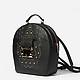 Рюкзак-трансформер из черной сафьяновой кожи, декорированный золотистыми заклепками  Cromia