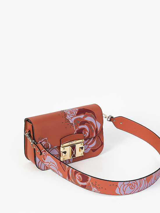 Коричневая сумочка-клатч из плотной гладкой кожи с цветочным принтом и двумя ремешками  Cromia
