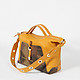 Оранжевая сумочка на ремне с люверсами  KELLEN