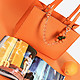 Оранжевая сумочка на ручке с декором  Roberta Gandolfi