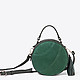 Круглая кожаная сумочка-кроссбоди зеленого цвета с замшевой вставкой  Richet
