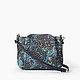 Голубая сумочка кросс-боди из мягкой кожи с объемным цветочным тиснением и тремя отделами  Alessandro Beato