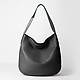 Черная сумка-хобо из мягкой кожи с серебристым декором  Gianni Chiarini