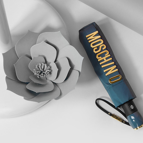 Темно-бирюзовый скаладной зонт  Moschino