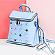 Дерзкая сумка-рюкзак из плотной голубой экокожи с крупными разноцветными шипами  Lera Nena