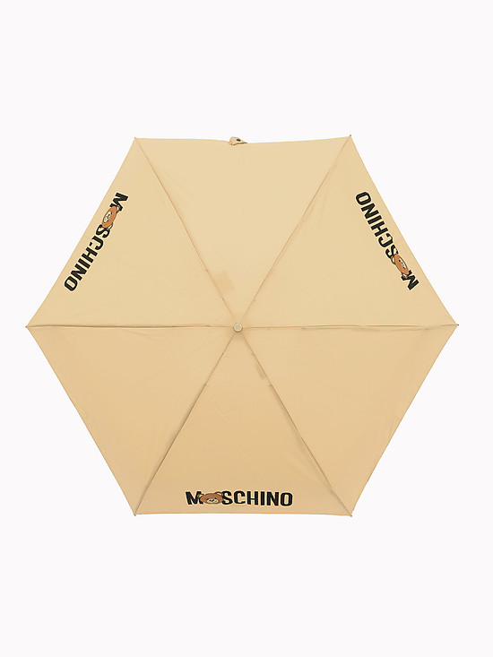 Однотонный бежевый зонт-автомат  с логотипом бренда  Moschino