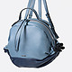 Голубой кожаный рюкзак с кулисками по бокам  Innue