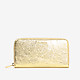 Горизонтальный кожаный кошелек Metallic Glitter в золотистом цвете  Coccinelle