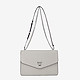 Минималистичная кожаная сумочка-кросс-боди Whitney на цепочке в сером цвете  DKNY